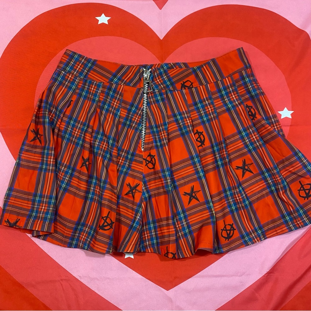 dolls kill plaid pleated skirt with symbols and chain